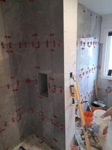 Ensuite bathroom renovation with freestanding tub and glass shower, Ottawa