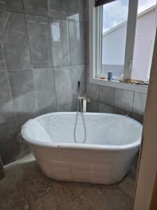 Ensuite bathroom renovation with freestanding tub and glass shower, Ottawa