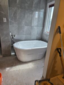 Ensuite bathroom renovation with freestanding tub and glass shower, Ottawa