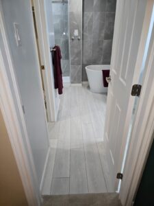 Ensuite bathroom renovation with freestanding tub and glass shower, Ottawa
