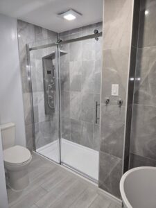 Ensuite bathroom renovation with freestanding tub and glass shower, Ottawa