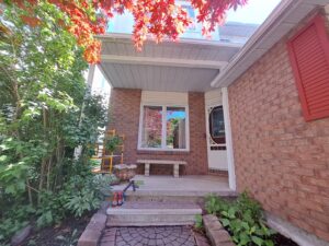 Front entry portico with timber posts, Ottawa