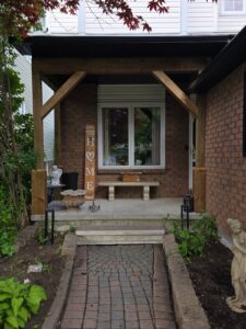 Front entry portico with timber posts, Ottawa