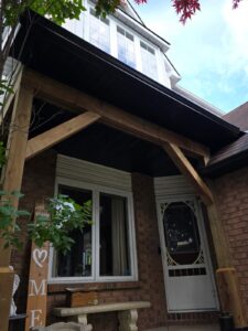 Front entry portico with timber posts, Ottawa