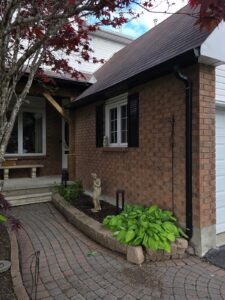 Front entry portico with timber posts, Ottawa