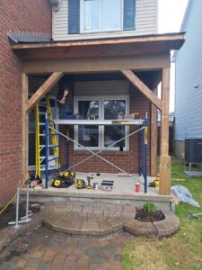 Front porch rebuild with timber posts and beams, Ottawa