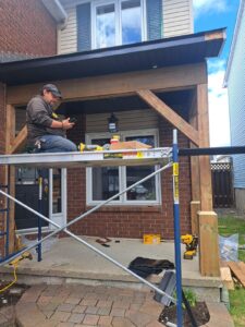 Front porch rebuild with timber posts and beams, Ottawa