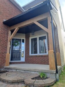 Front porch rebuild with timber posts and beams, Ottawa
