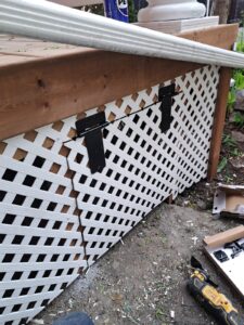 Front veranda rebuild on a red brick century home in Ottawa