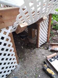 Front veranda rebuild on a red brick century home in Ottawa