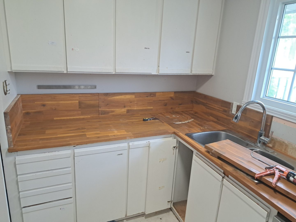 New butcher-block countertops and backsplash in an Ottawa kitchen renovation