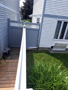 Vinyl privacy fence around a pool yard, Ottawa