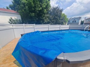 Vinyl privacy fence around a pool yard, Ottawa