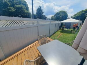 Vinyl privacy fence around a pool yard, Ottawa