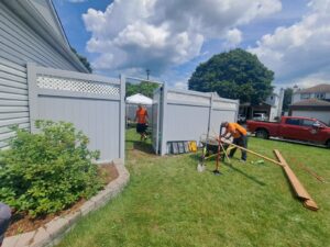Vinyl privacy fence around a pool yard, Ottawa