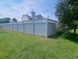 Vinyl privacy fence around a pool yard, Ottawa